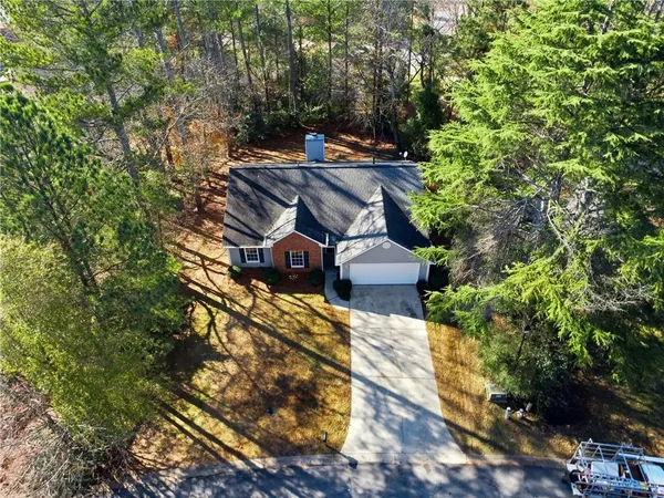 an aerial view of residential house with outdoor space