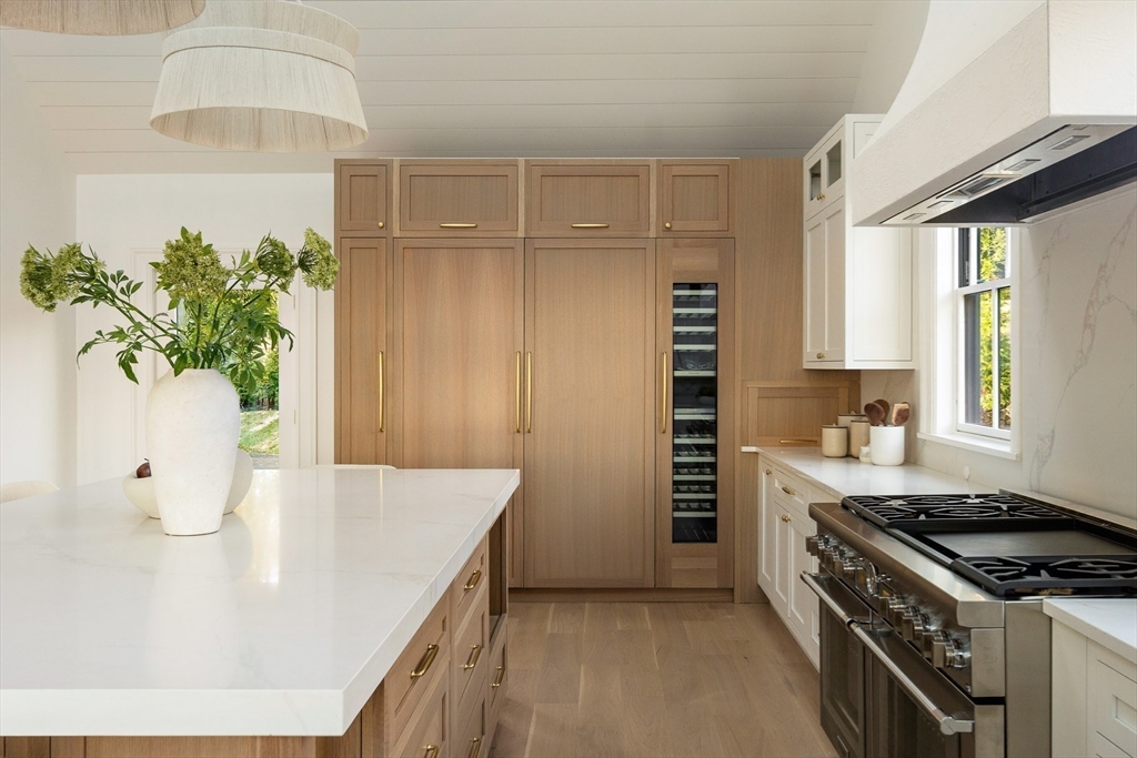 9 Little Nahant Road Nahant, MA 01908 - Photo 21 of 41 a kitchen with stainless steel appliances granite countertop a sink a stove and a refrigerator