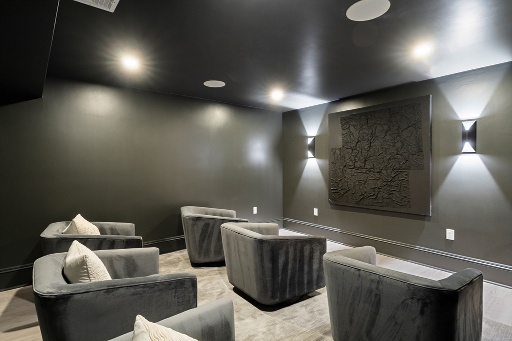 9 Little Nahant Road Nahant, MA 01908 - Photo 39 of 41 a living room with furniture and a flat screen tv