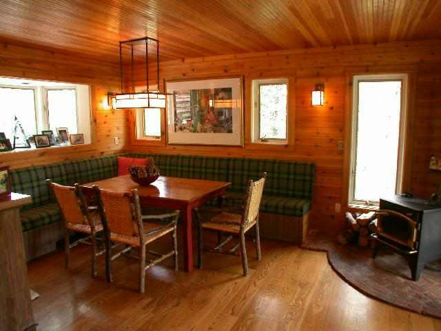 2165 Maroon Creek Road, Unit ROAD Aspen, CO 81611 - Photo 6 of 6 a view of a dining room with furniture window and outside view