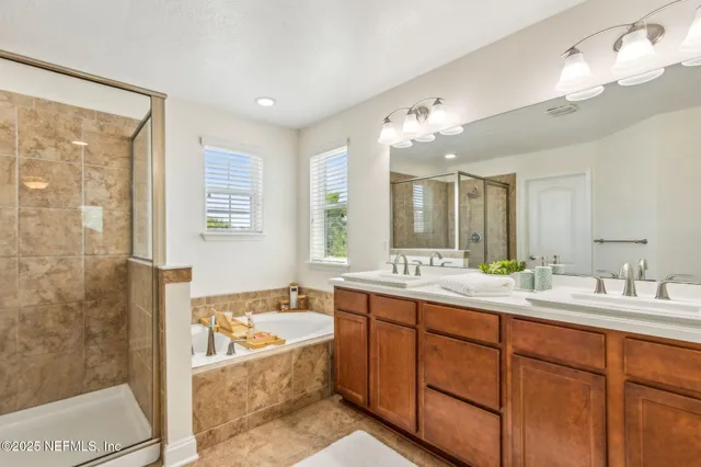 a view of a room with a window and wooden floor