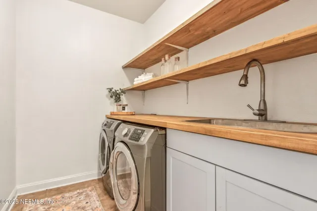 a view of a yard with an outdoor space