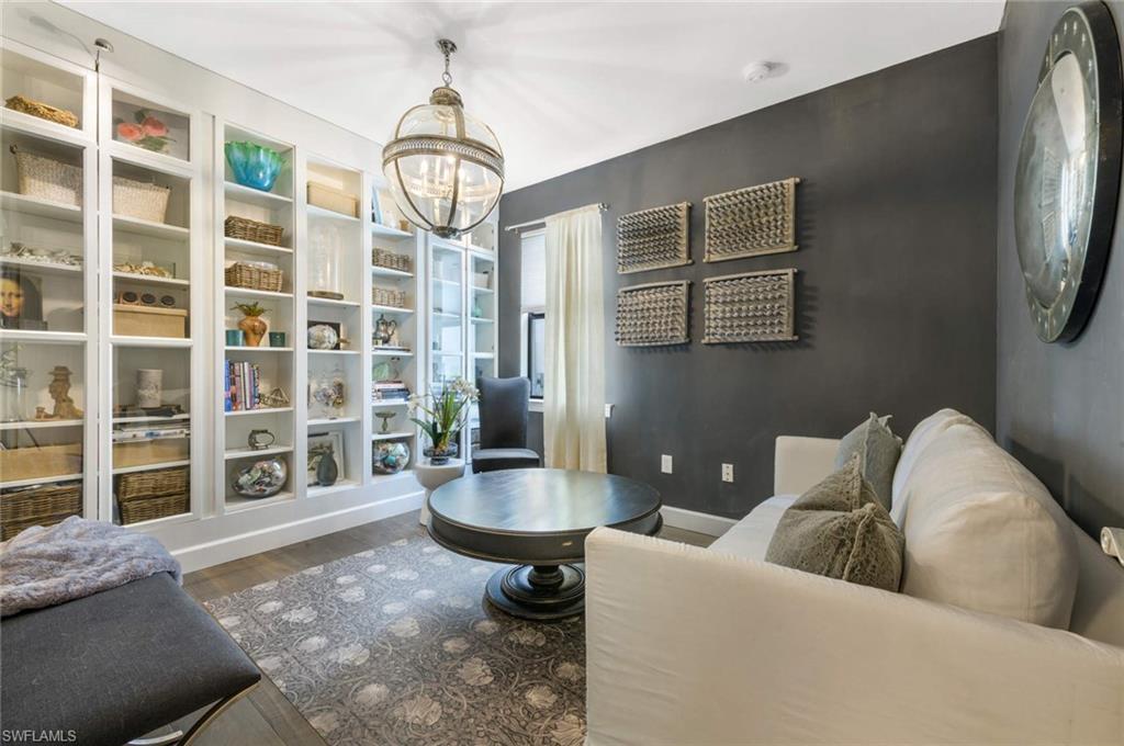 16359 Halberry Lane Naples, FL 34110 - Photo 12 of 30 a living room with furniture and a window