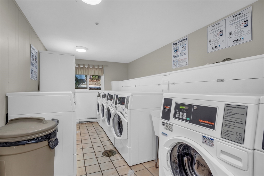 208 Swanson Road, Unit 526 Boxborough, MA 01719 - Photo 19 of 23 a utility room with dryer and washer