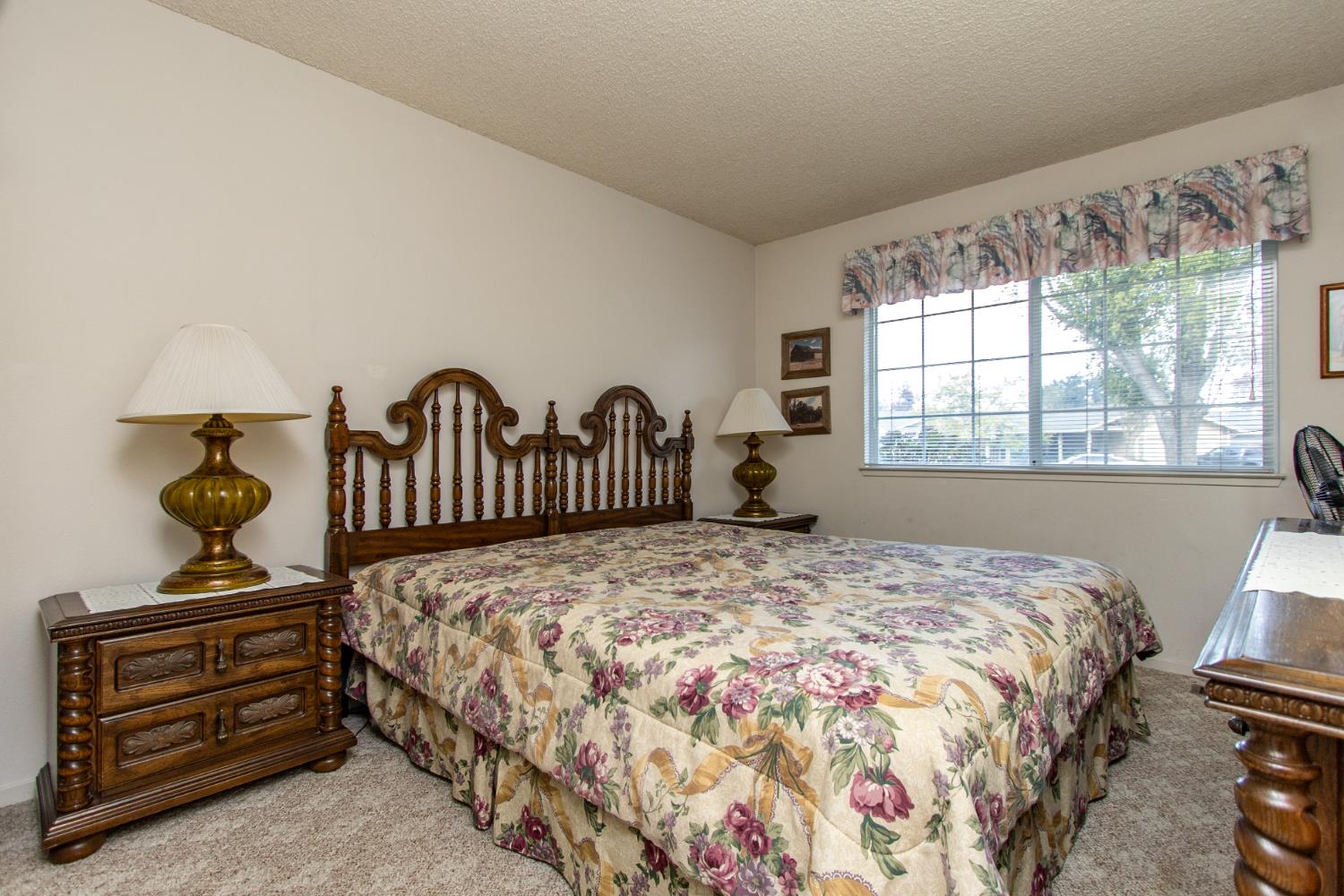 1540 Switzer Court Modesto, CA 95350 - Photo 21 of 43 a bedroom with a bed and a window