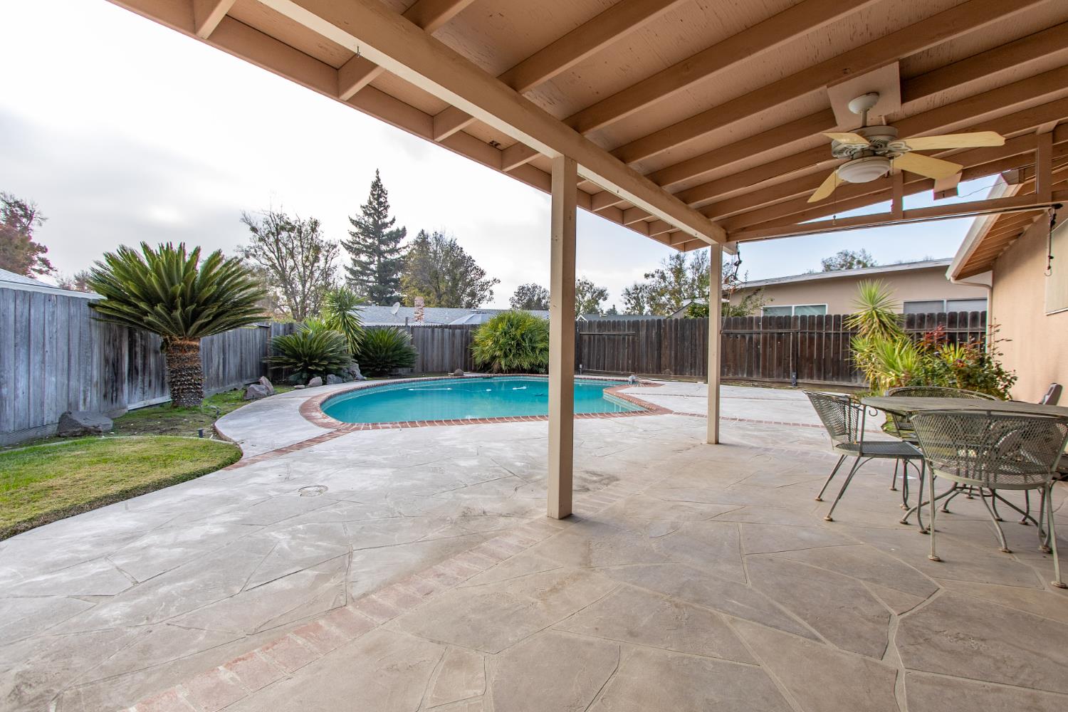 1540 Switzer Court Modesto, CA 95350 - Photo 26 of 43 a view of a porch with furniture and garden