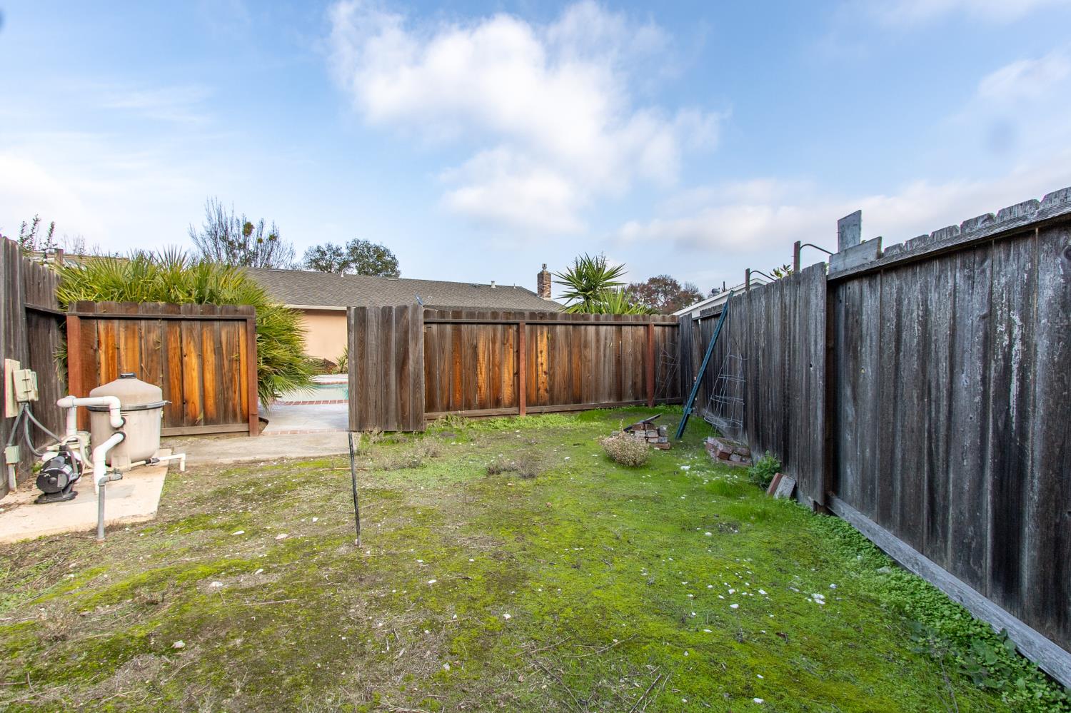 1540 Switzer Court Modesto, CA 95350 - Photo 30 of 43 a view of a chair and table in the backyard