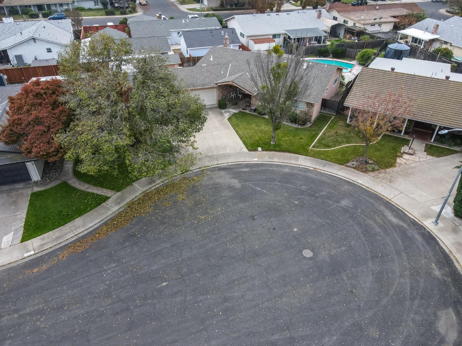 1540 Switzer Court Modesto, CA 95350 - Photo 37 of 43 an aerial view of a house with garden space and street view