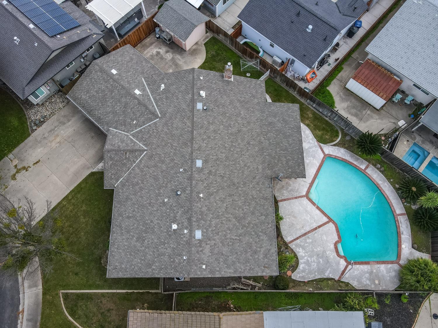 1540 Switzer Court Modesto, CA 95350 - Photo 38 of 43 an aerial view of a house with a yard and a garden