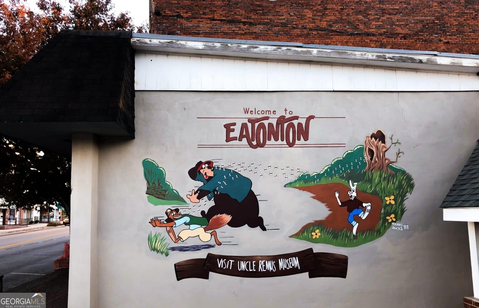 0 Mcdade Road Eatonton, GA 31024 - Photo 16 of 21 a table with potted plants and a bench