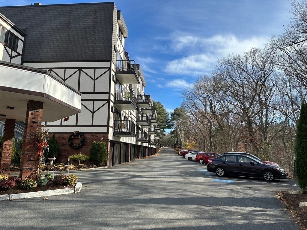 9 Broadway, Unit 223 Saugus, MA 01906 - Photo 12 of 23 a view of a street that has couple of cars parked on the road