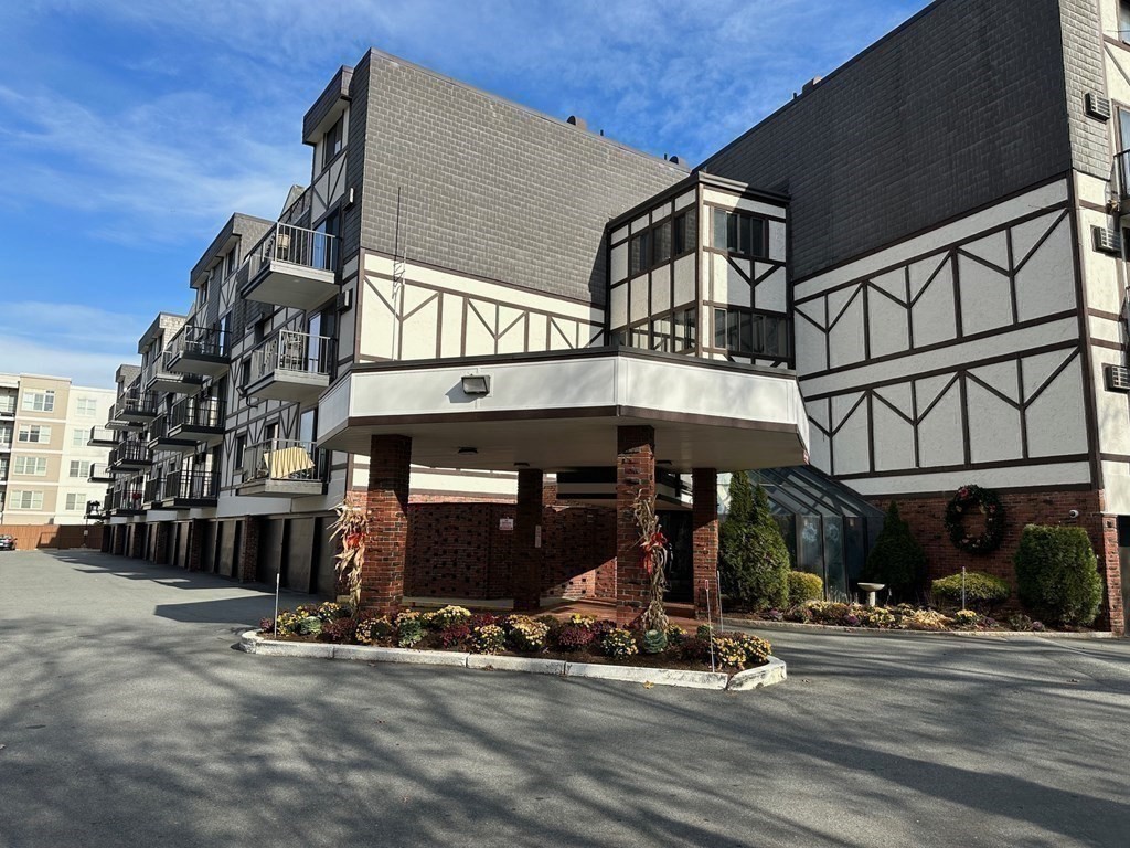 9 Broadway, Unit 223 Saugus, MA 01906 - Photo 14 of 23 a front view of a building with street