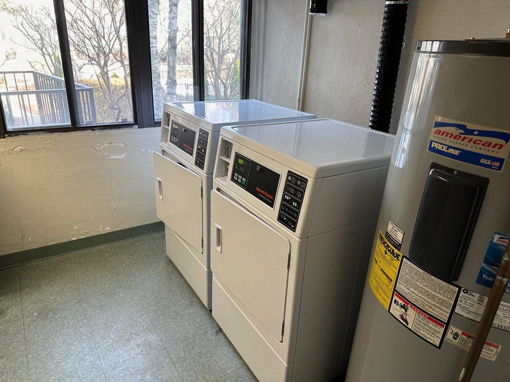 9 Broadway, Unit 223 Saugus, MA 01906 - Photo 23 of 23 a utility room with dryer and washer