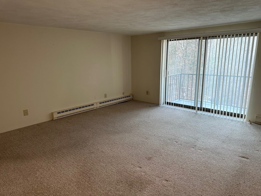 9 Broadway, Unit 223 Saugus, MA 01906 - Photo 4 of 23 a view of a room with a large window