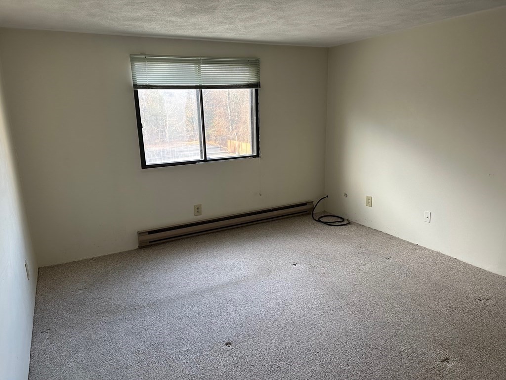 9 Broadway, Unit 223 Saugus, MA 01906 - Photo 7 of 23 an empty room with a window