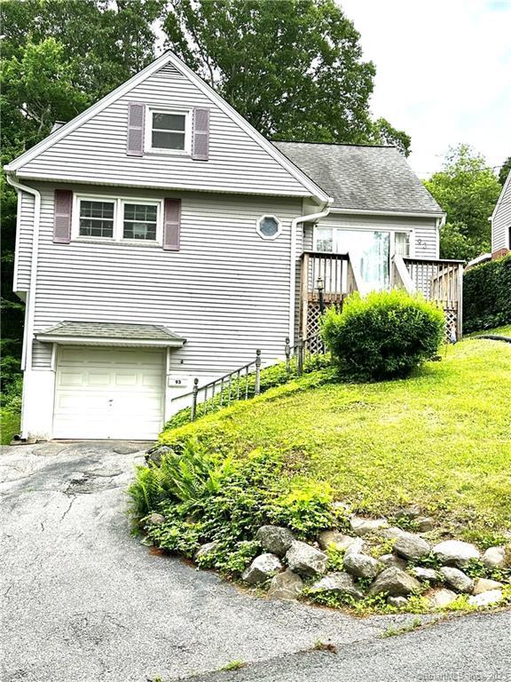 93 Wayland Avenue Waterbury, CT 06708 - Photo 1 of 1 a front view of a house with garden