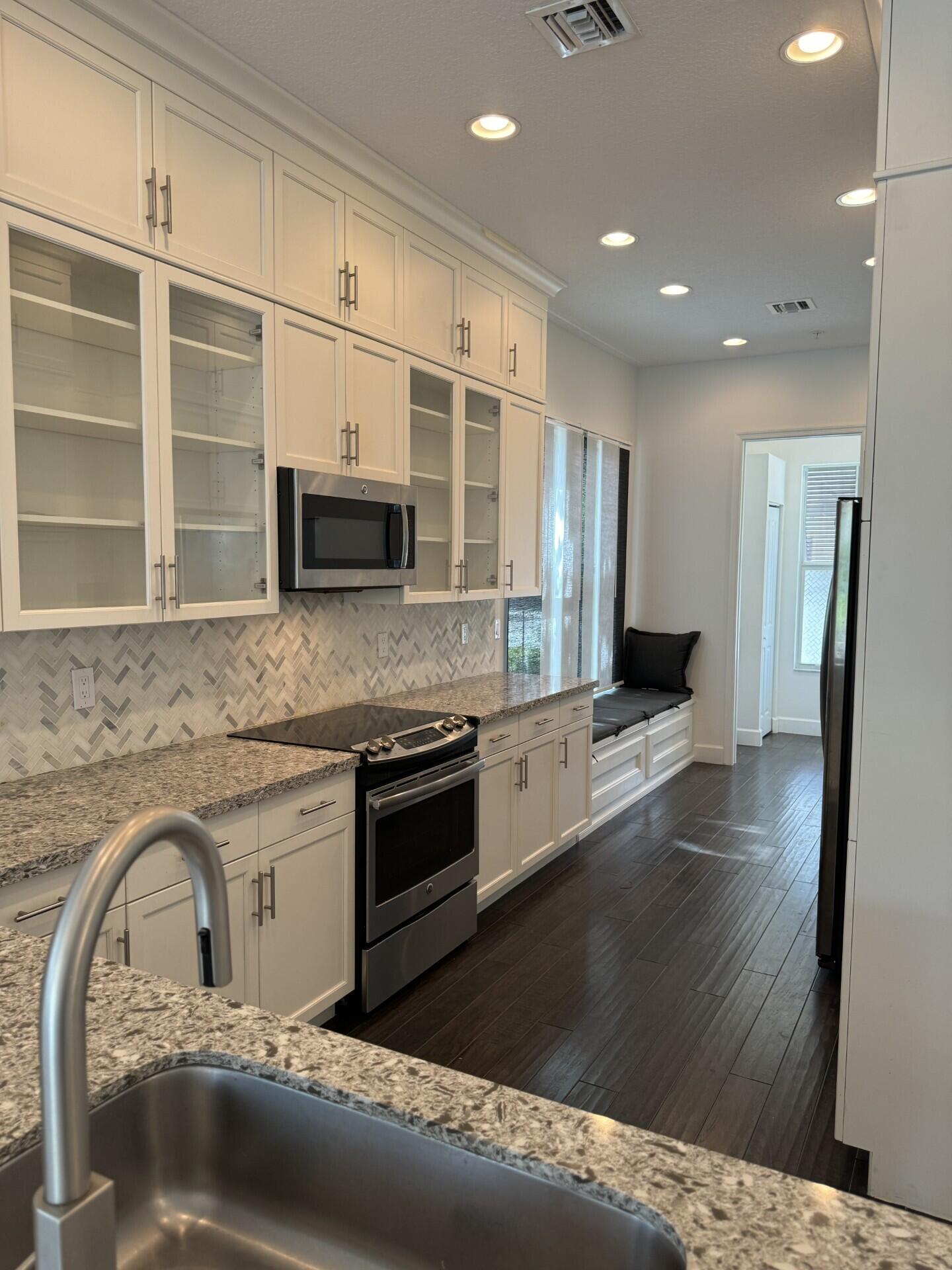 6640 Quiet Wave Trail, Unit 66 Boca Raton, FL 33433 - Photo 9 of 44 Kitchen - Custom Built-Ins