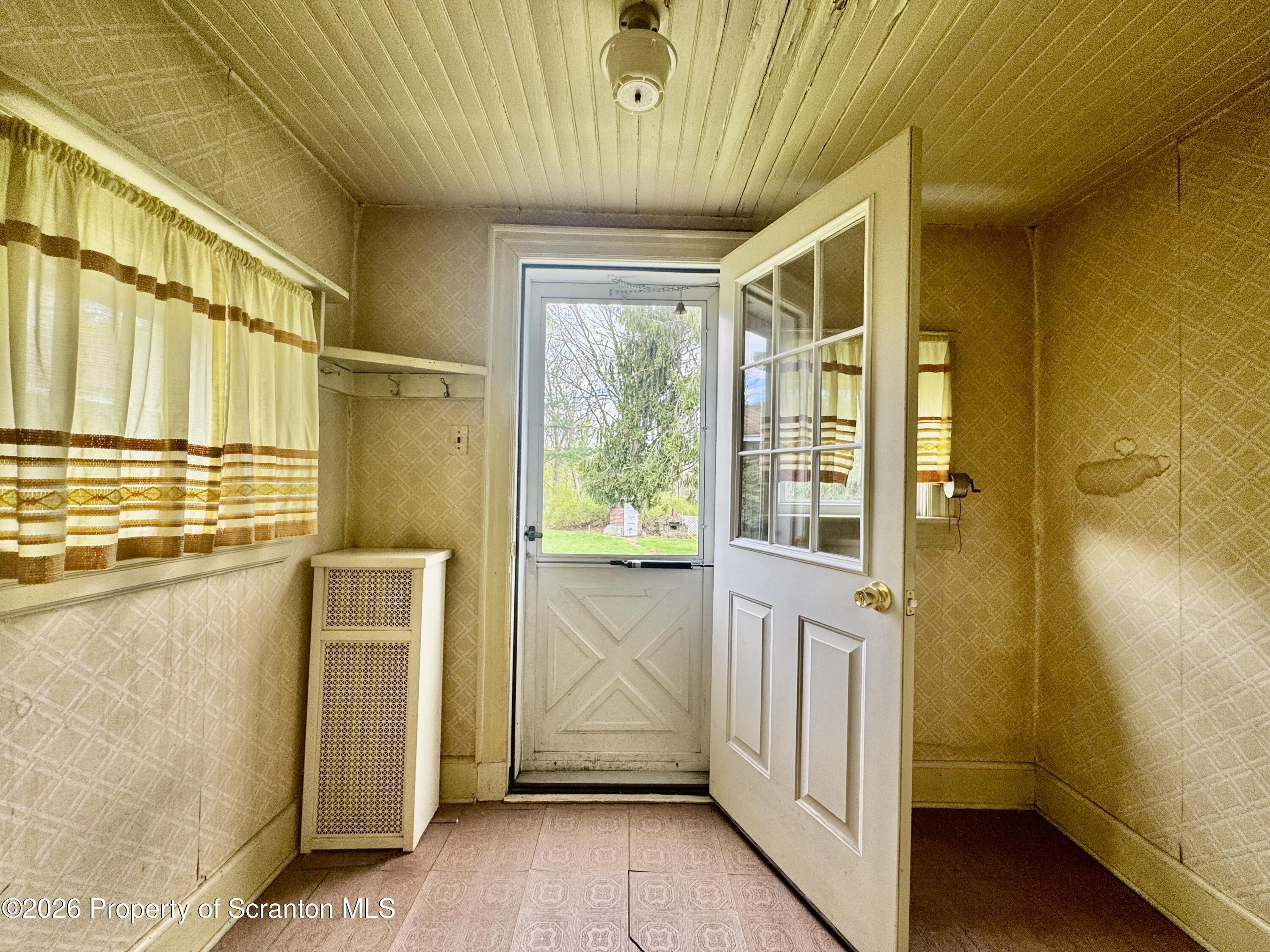 2120 Myrtle Street Scranton, PA 18510 - Photo 26 of 42 a view of entryway with wooden floor and windows