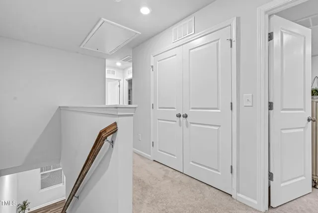a bathroom with a sink double vanity and a mirror