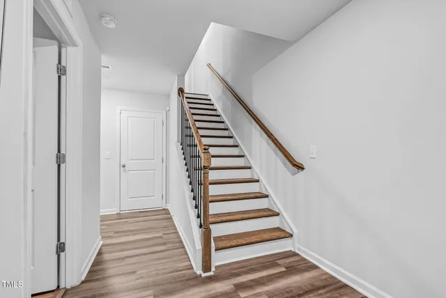 a room with a bed and a window