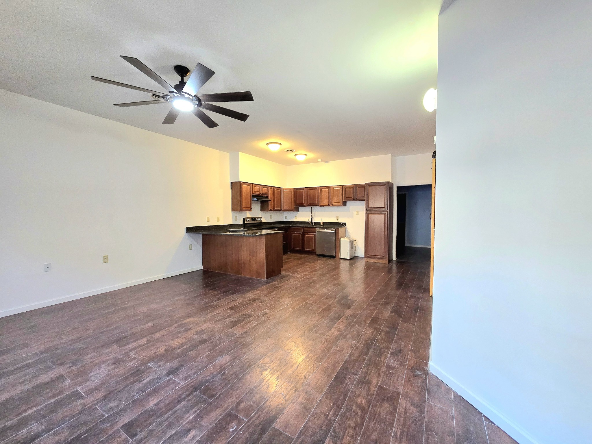 321 John Locke Road McMinnville, TN 37110 - Photo 11 of 57 a view of a kitchen with a sink and a refrigerator