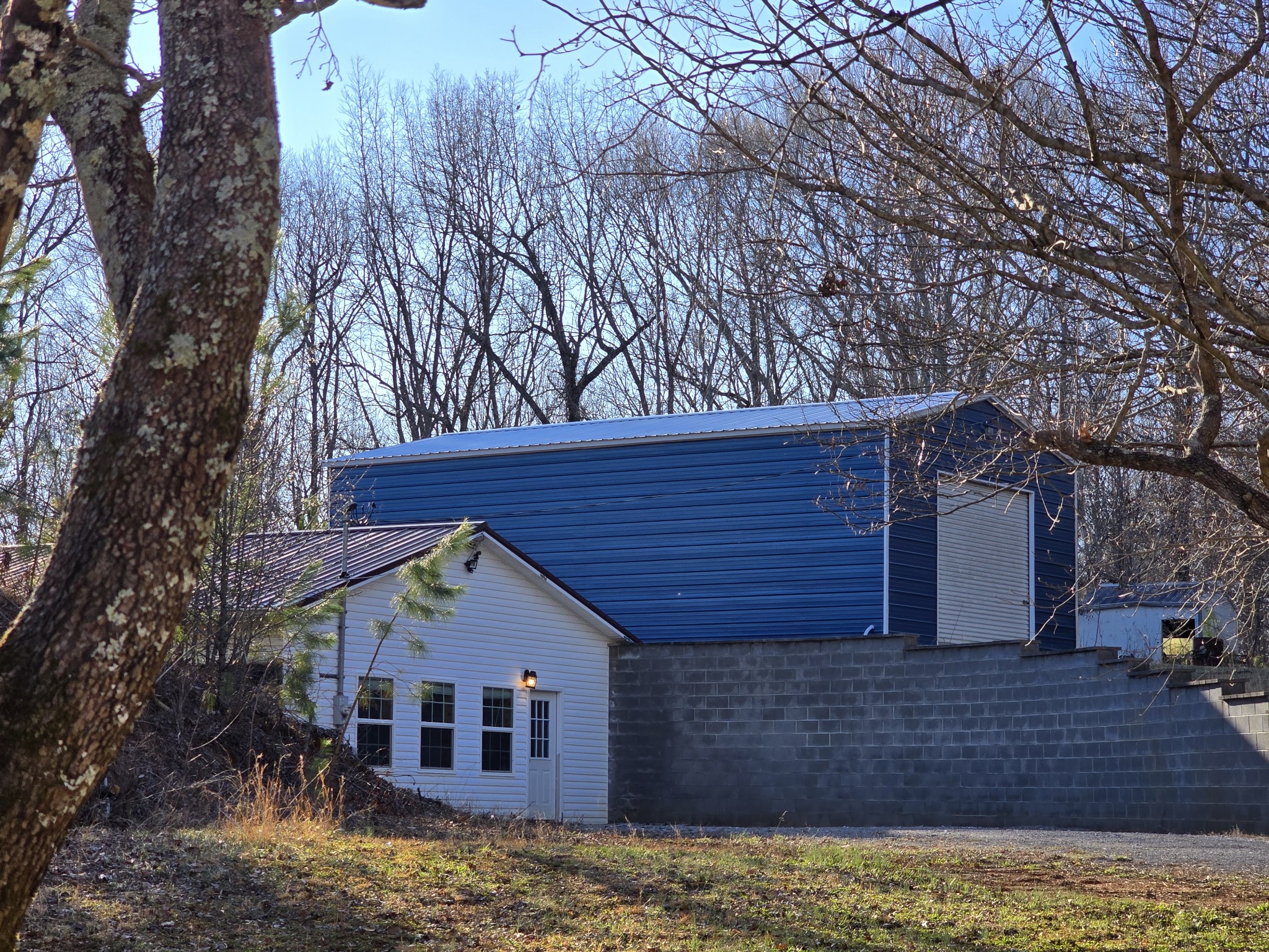 321 John Locke Road McMinnville, TN 37110 - Photo 2 of 57 a front view of a house with garden