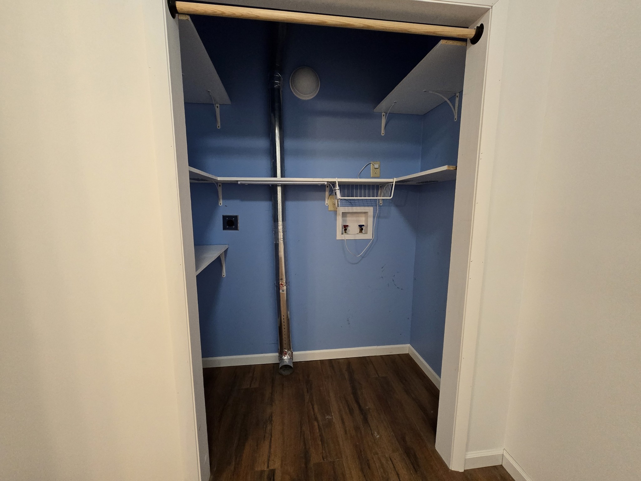 321 John Locke Road McMinnville, TN 37110 - Photo 23 of 57 a view of walk in closet with wooden floor