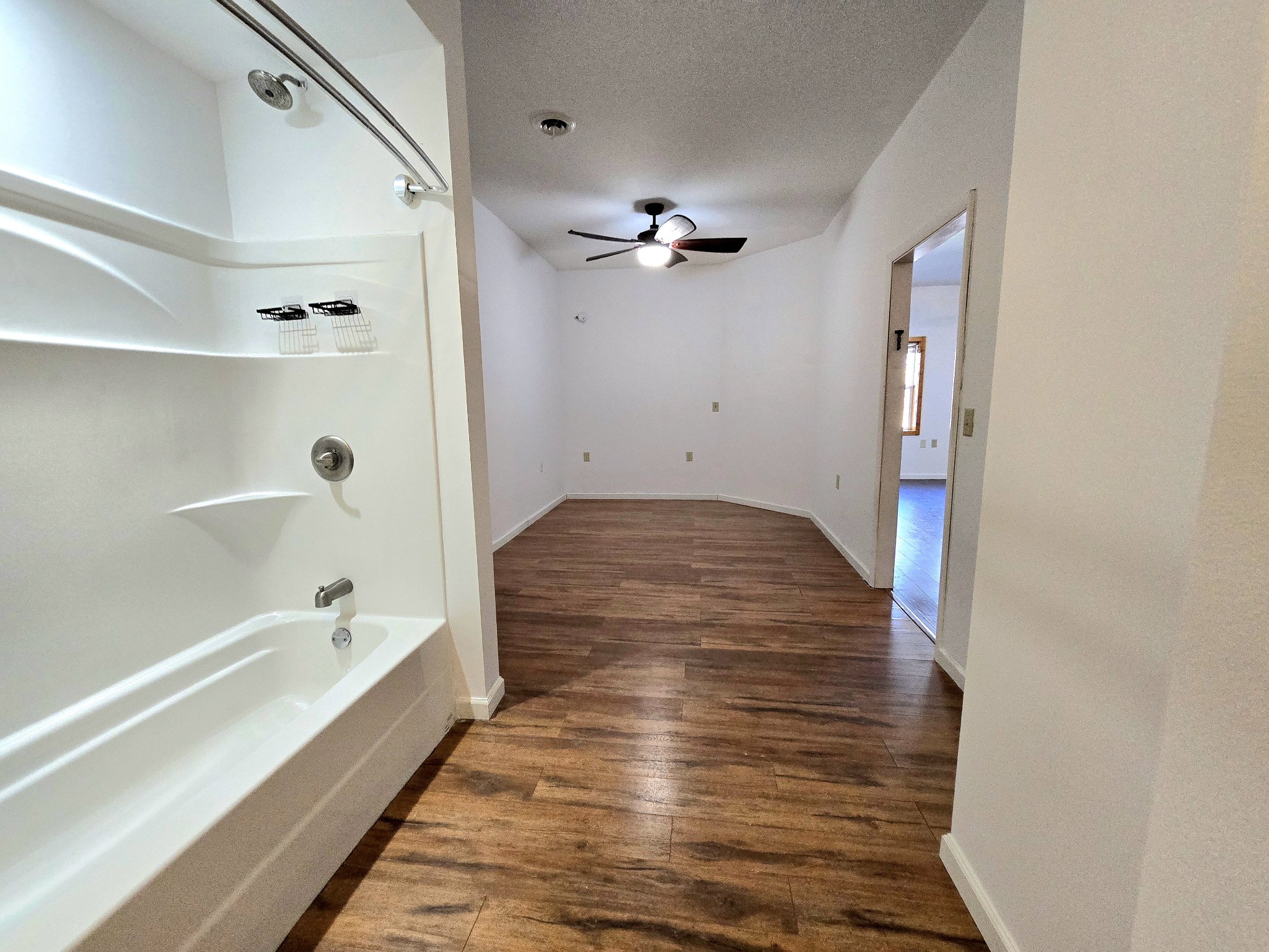321 John Locke Road McMinnville, TN 37110 - Photo 26 of 57 a bathroom with a bathtub and shower