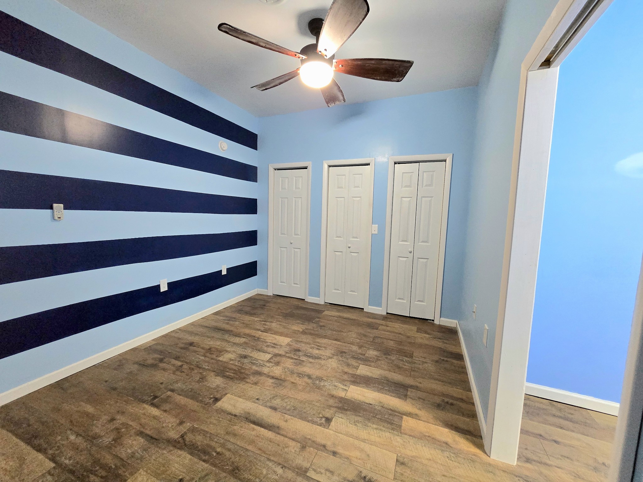 321 John Locke Road McMinnville, TN 37110 - Photo 29 of 57 a view of a room with a ceiling fan and a rug