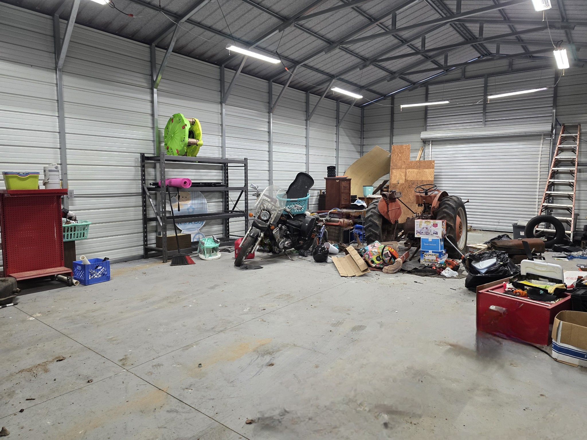 321 John Locke Road McMinnville, TN 37110 - Photo 40 of 57 a view of a storage room with a lot of stuff