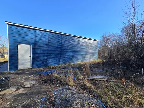 a house view with a backyard space