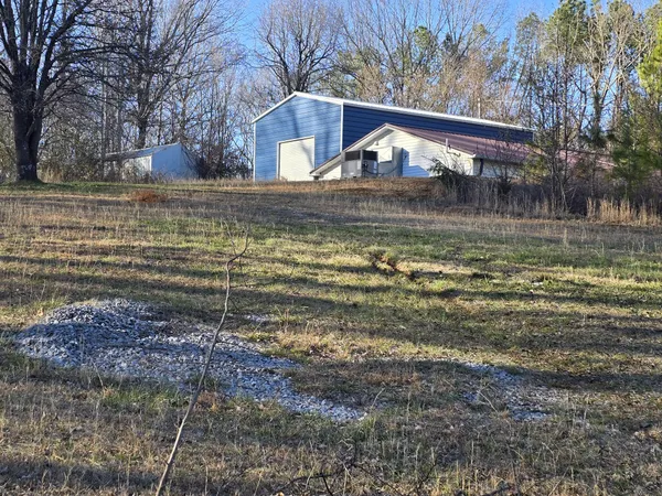 a view of backyard with kitchen