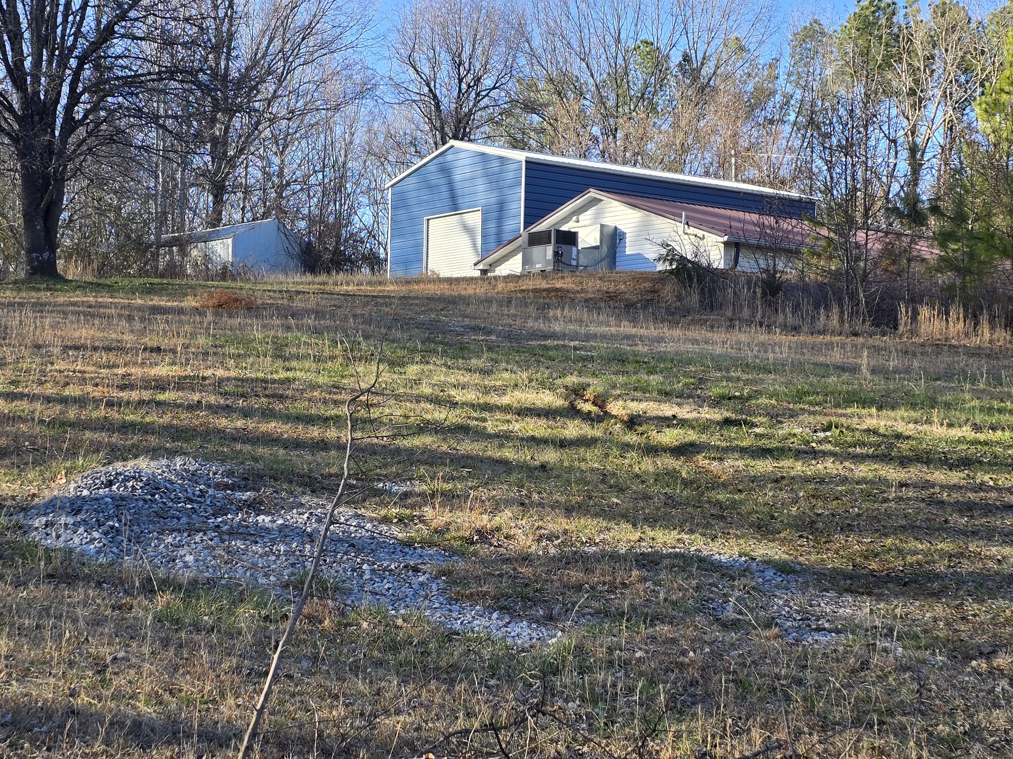 321 John Locke Road McMinnville, TN 37110 - Photo 46 of 57 a view of a house with a yard