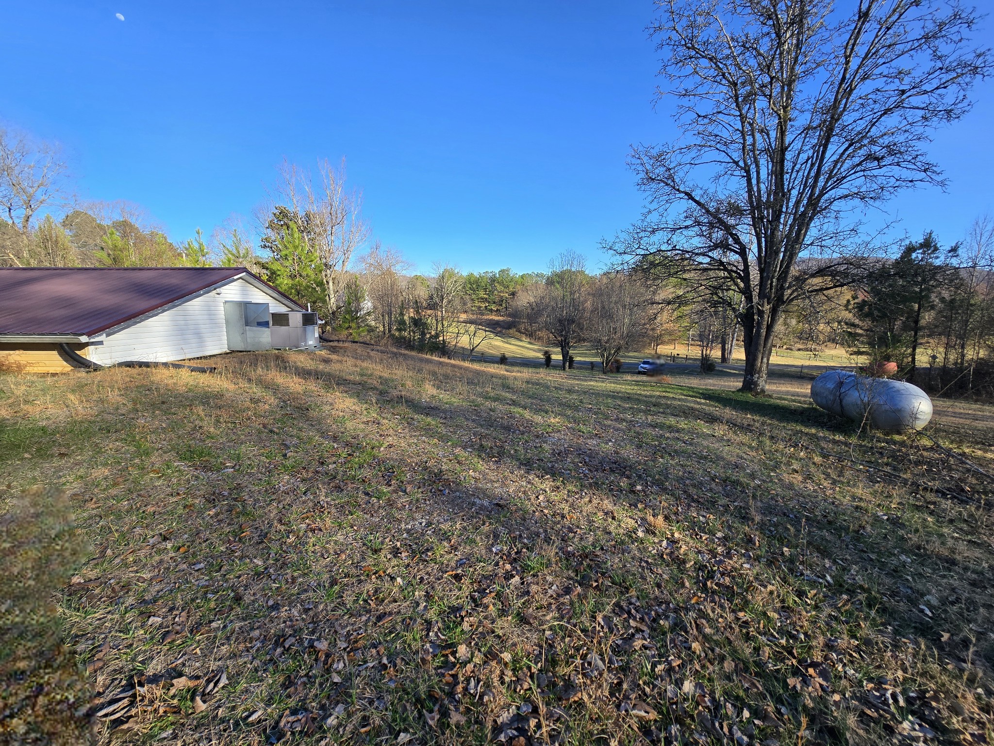 321 John Locke Road McMinnville, TN 37110 - Photo 53 of 57 a backyard of a house with a table and chairs