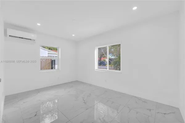 a view of a storage & utility room with washer and dryer