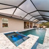 a view of a living room and dining room