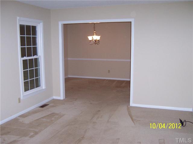 1908 Medfield Road Raleigh, NC 27607 - Photo 3 of 9 a view of empty room with window