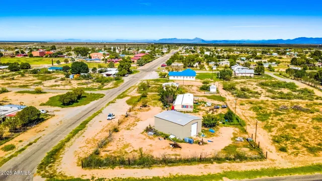 a view of swimming pool and an outdoor seating