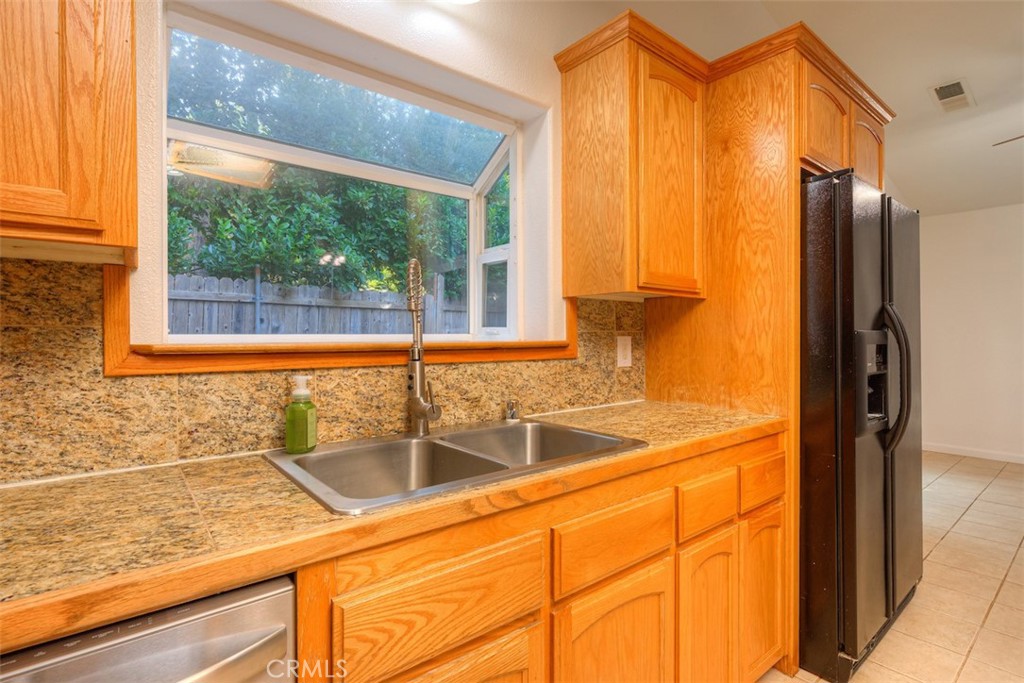 14503 Colter Way Magalia, CA 95954 - Photo 19 of 42 a view of a sink and a window