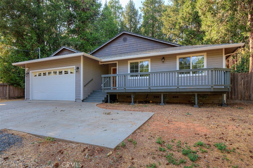 14503 Colter Way Magalia, CA 95954 - Photo 2 of 42 a view of a house with a yard and wooden fence