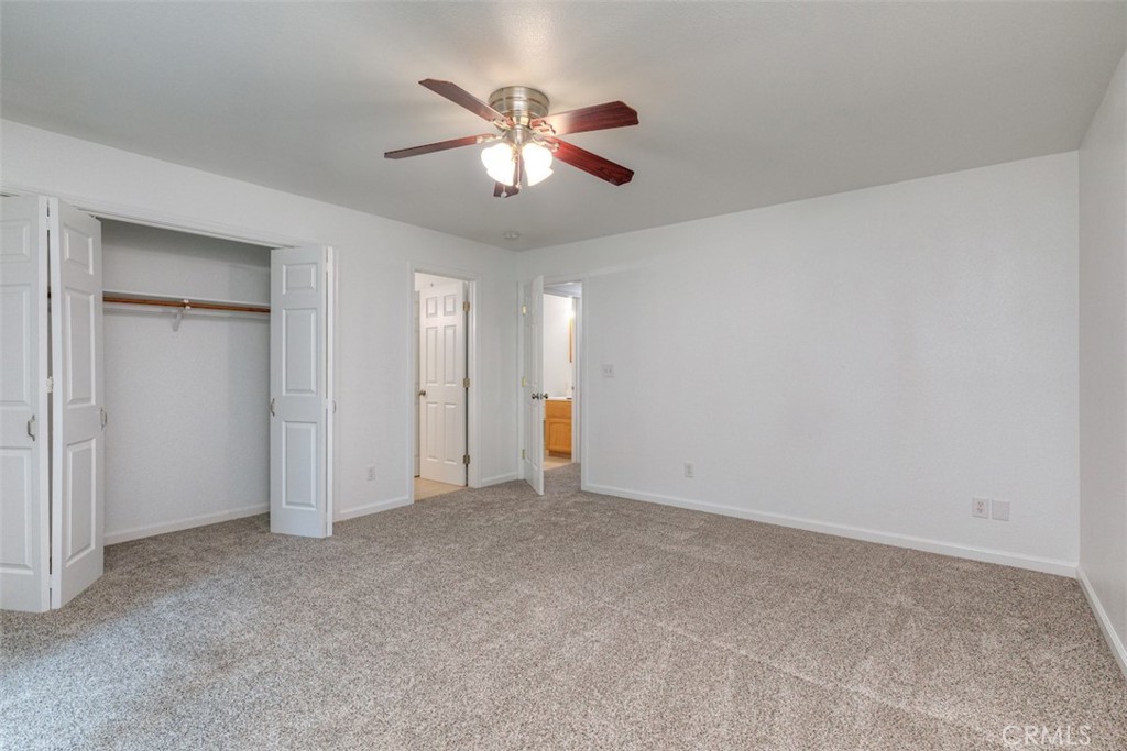 14503 Colter Way Magalia, CA 95954 - Photo 25 of 42 a view of an empty room with chandelier fan