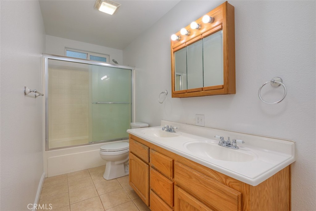 14503 Colter Way Magalia, CA 95954 - Photo 26 of 42 a bathroom with a sink toilet and shower