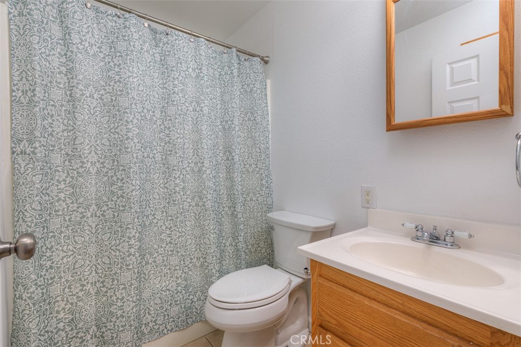 14503 Colter Way Magalia, CA 95954 - Photo 32 of 42 a bathroom with a sink and a toilet