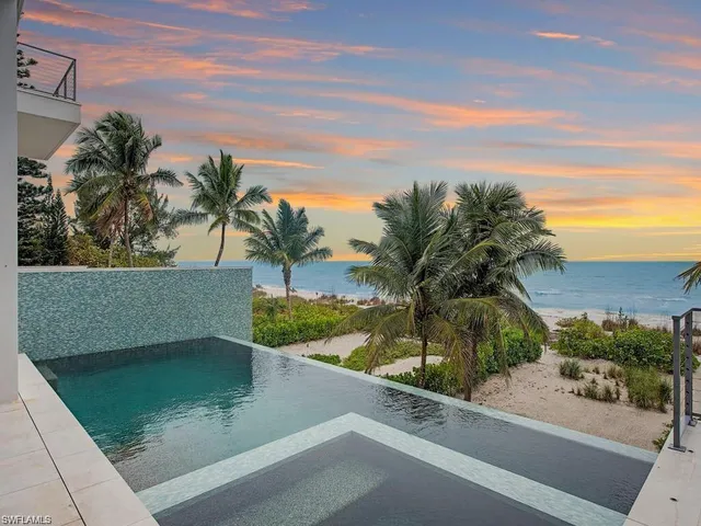 a view of a yard and front view of a house