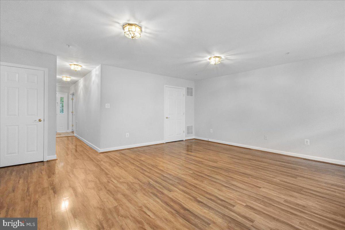 3618 Sprigg Street South Frederick, MD 21704 - Photo 16 of 37 a view of empty room with wooden floor