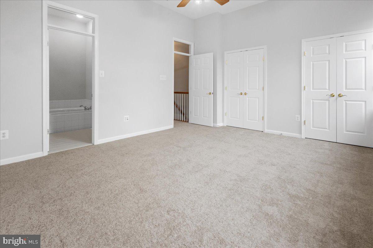 3618 Sprigg Street South Frederick, MD 21704 - Photo 30 of 37 an empty room with closet and windows