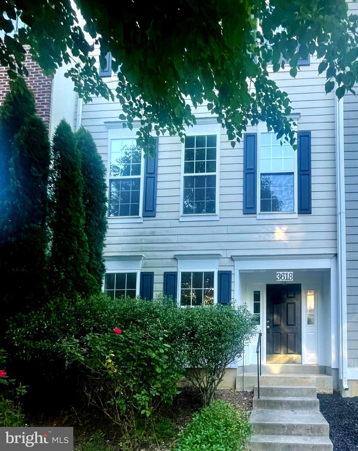 3618 Sprigg Street South Frederick, MD 21704 - Photo 35 of 37 a front view of a house with trees and plants