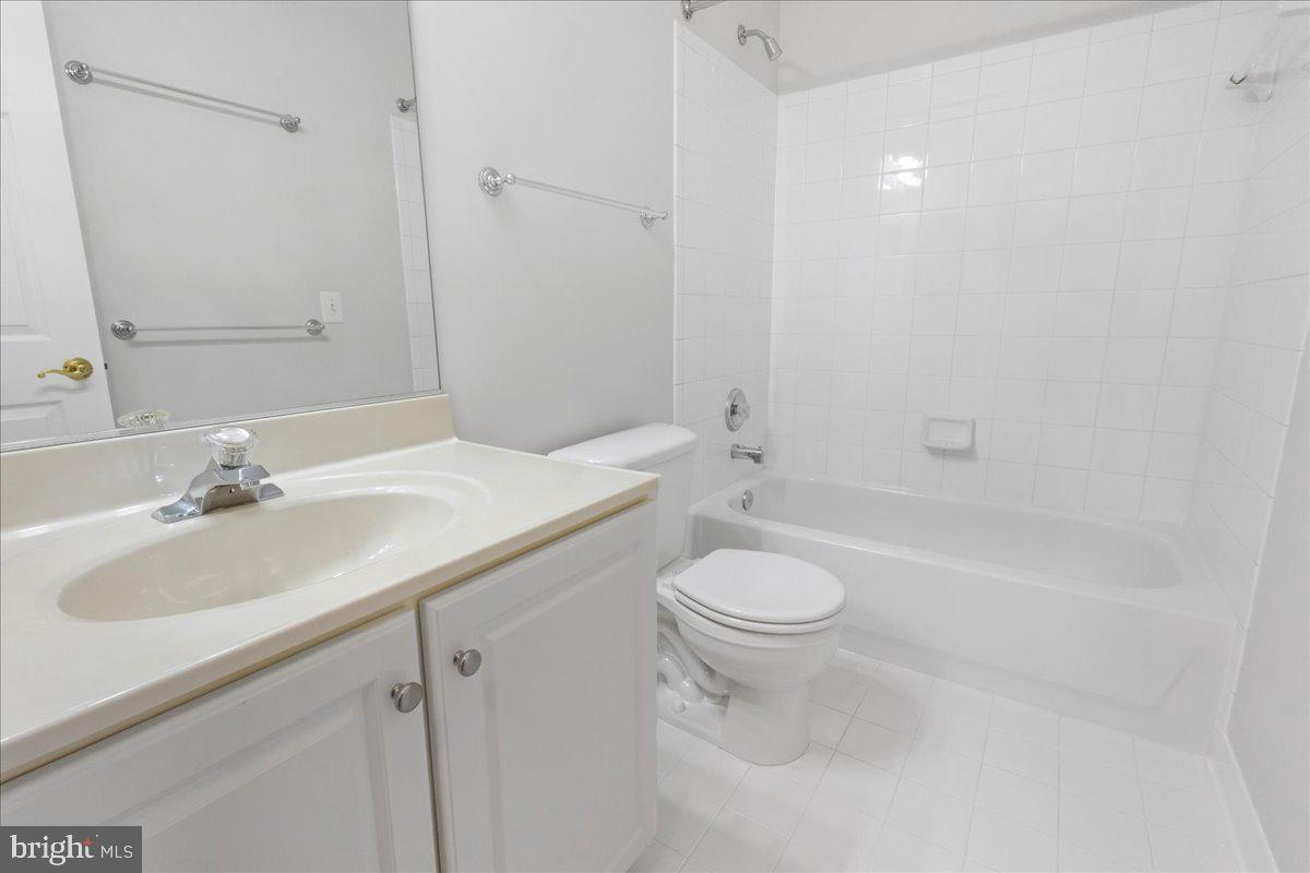 3618 Sprigg Street South Frederick, MD 21704 - Photo 5 of 37 a bathroom with a sink a toilet and shower