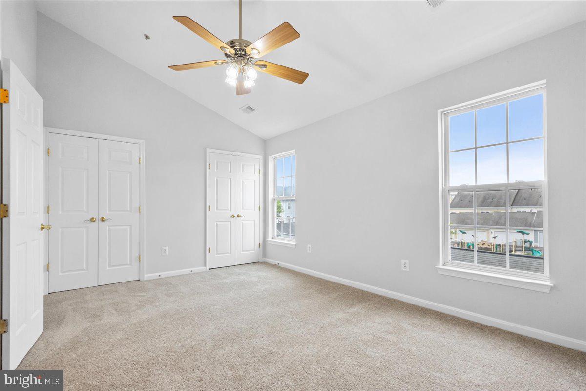 3618 Sprigg Street South Frederick, MD 21704 - Photo 7 of 37 an empty room with windows and fan