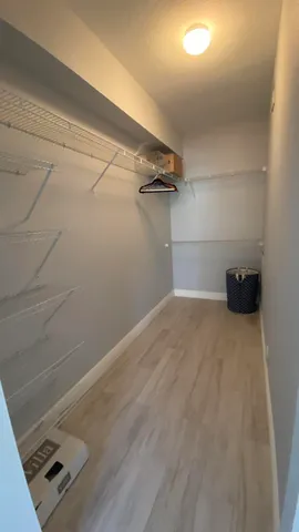 a view of a room with racks on the wall